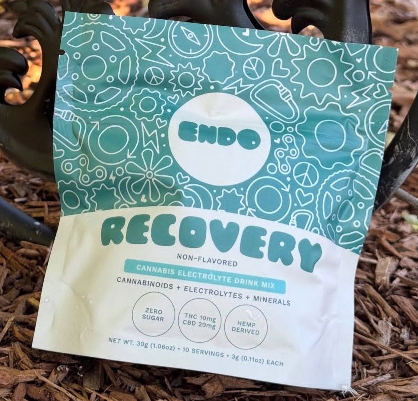 Endo Recovery drink mix package on mulch
